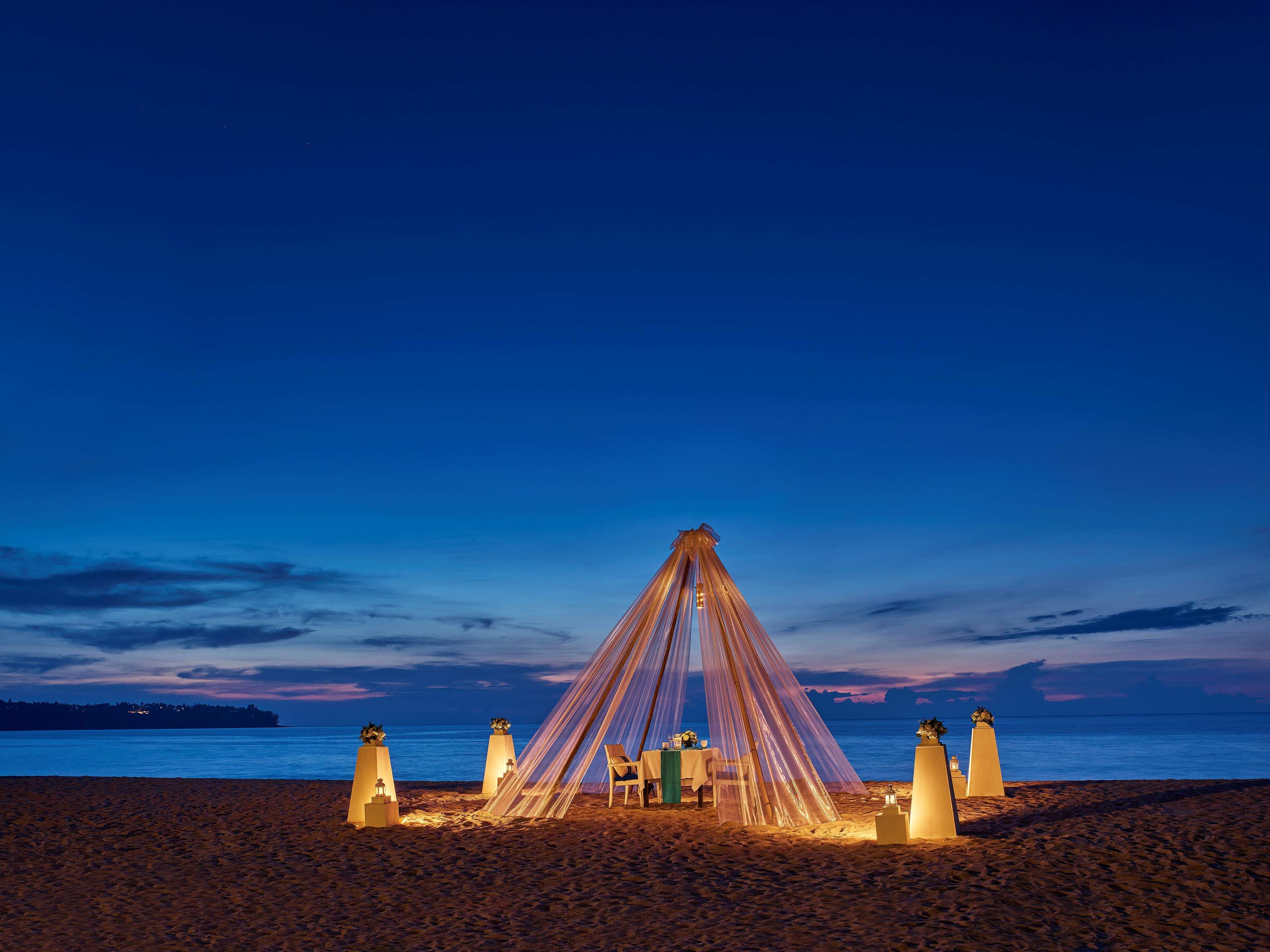 Dusit Thani Laguna Phuket Praia de Bang Tao Exterior foto The beach at the resort